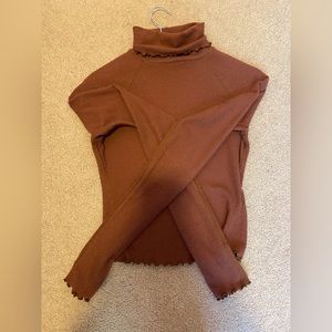 Brown Urban Outfitters cropped turtleneck.